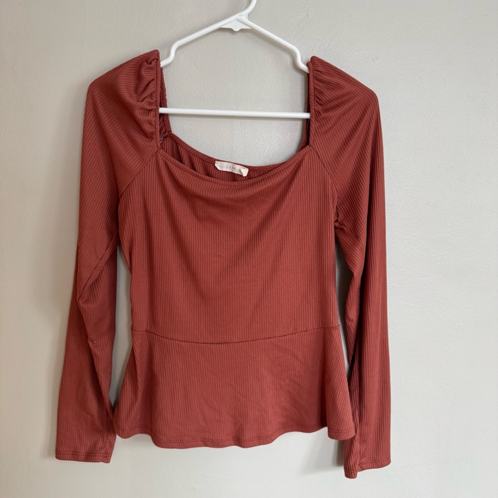 Dry goods, Square neck, long sleeve ribbed material with slightly peplum bottom